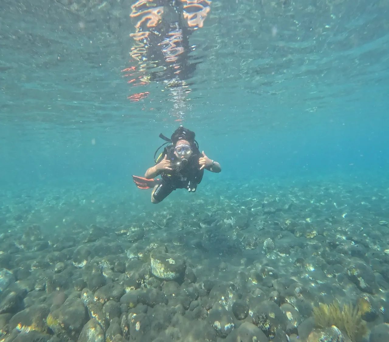 Diver exploring the USAT Liberty Wreck in Tulamben, Bali